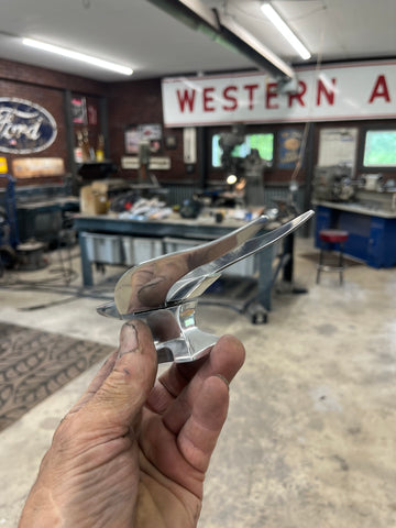 Flying Anvil hood ornament