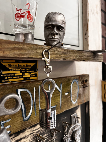 High polish piston key chain